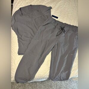 6 pairs of scrubs! (1 NWT, 1 NWOT, 4 used in great condition)
